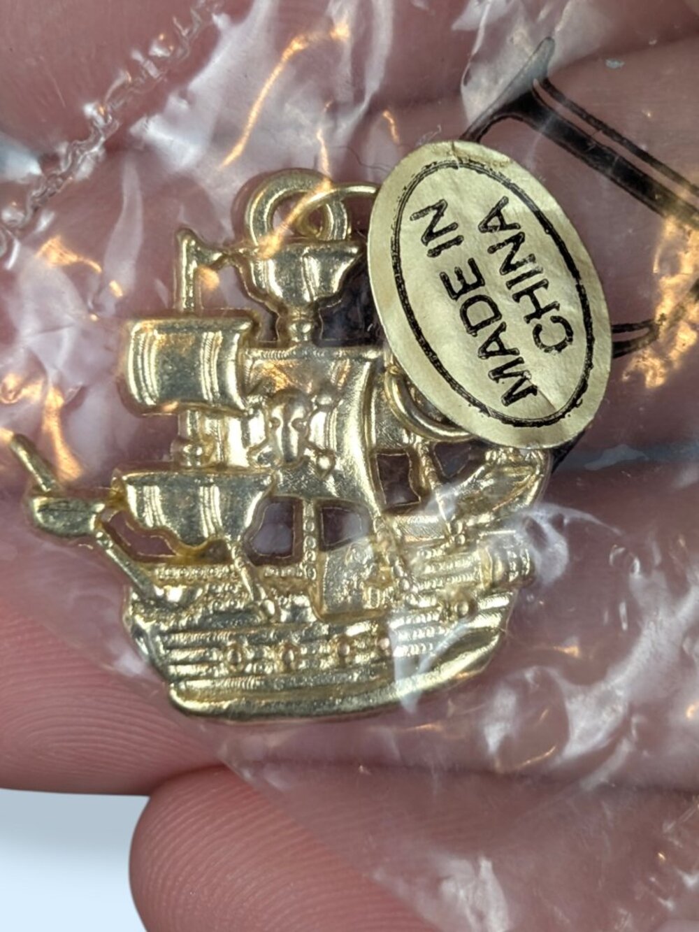 NWT Gold Tone Diamond International Ship Charm